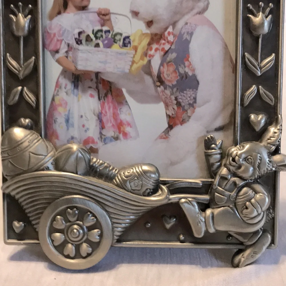 Silver metal rabbit with wheel barrel of eggs picture frame.